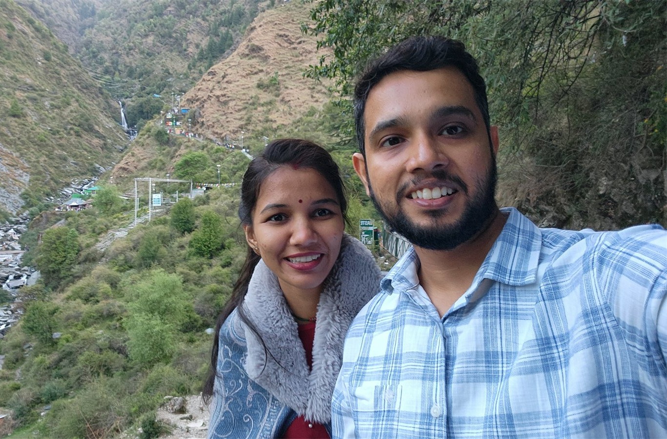 The two of us taking a selfie above a mountain valley