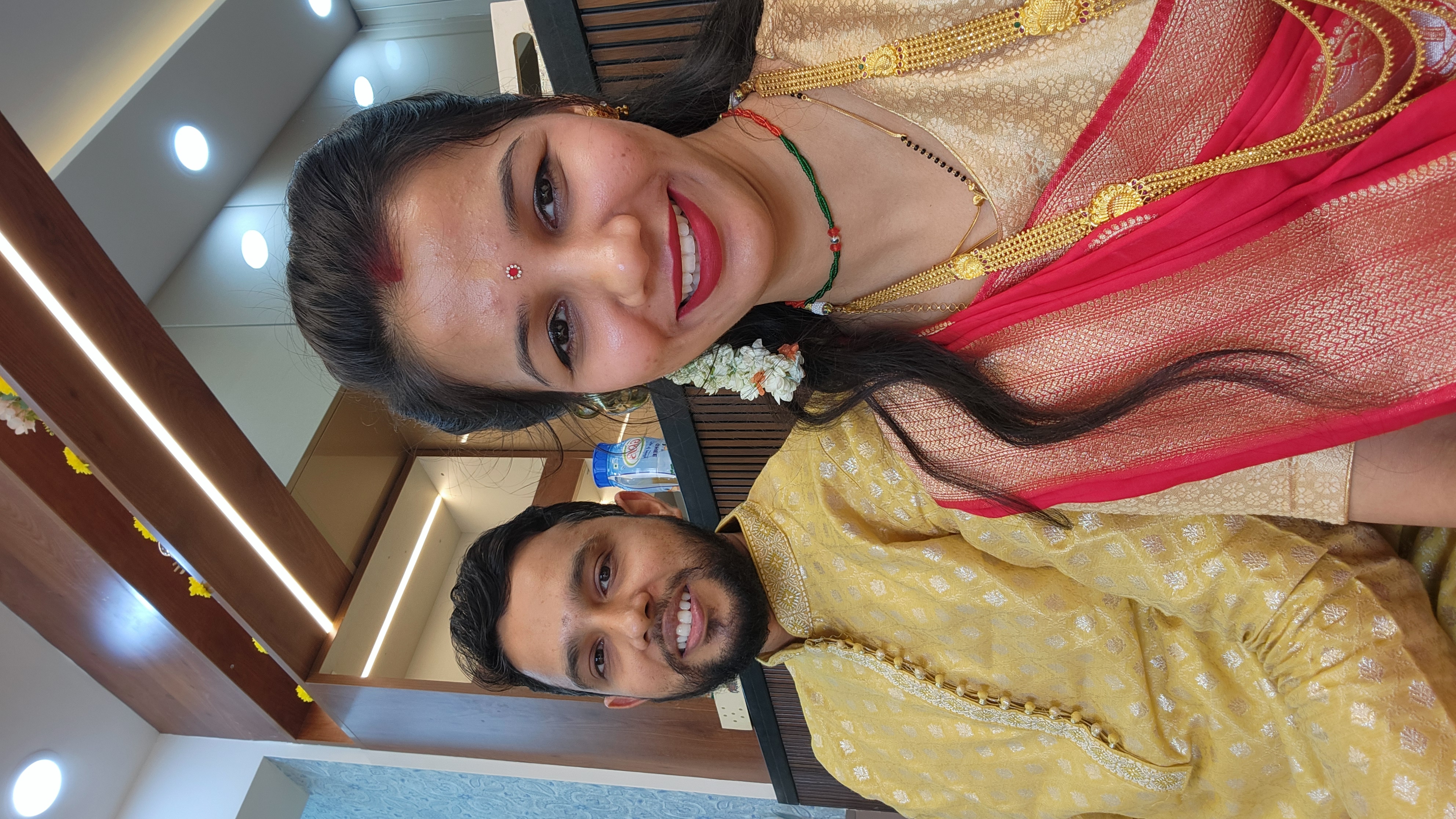 Couple smiling together in colorful traditional clothes