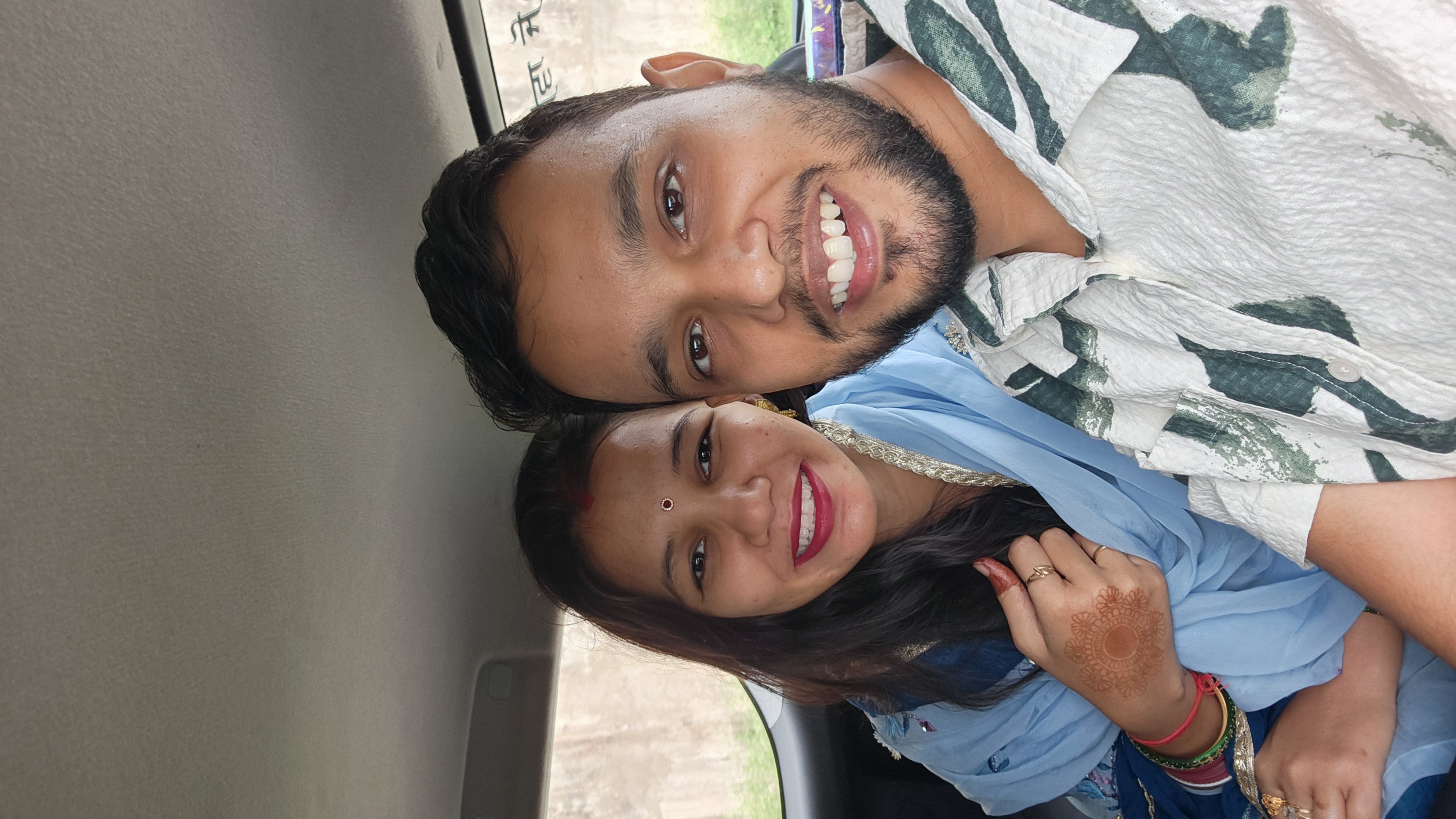 Couple sitting close together during a car ride