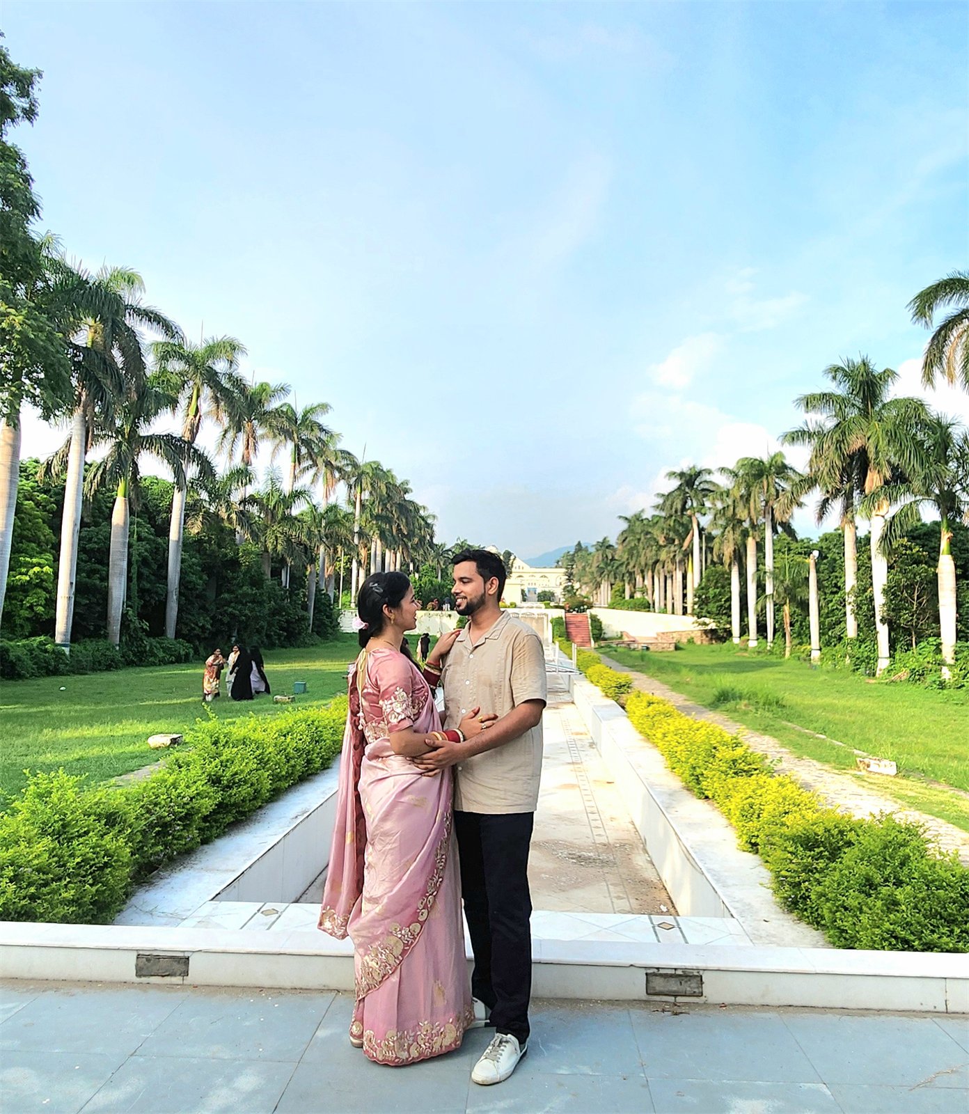 The two of us looking at each other in a long palace garden