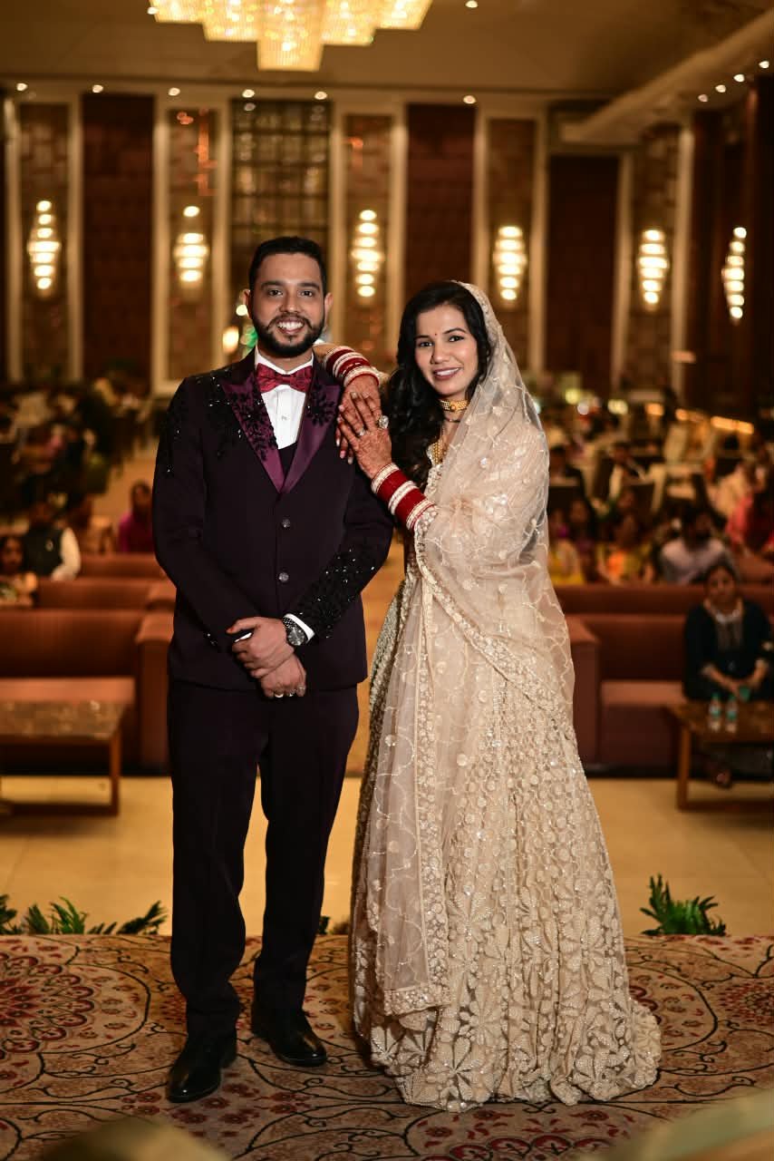 The two of us posing together in formal wedding clothes